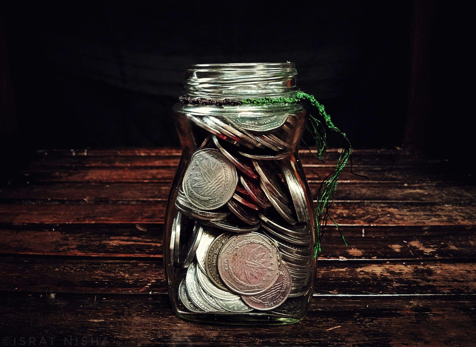 clear glass jar on brown wooden table