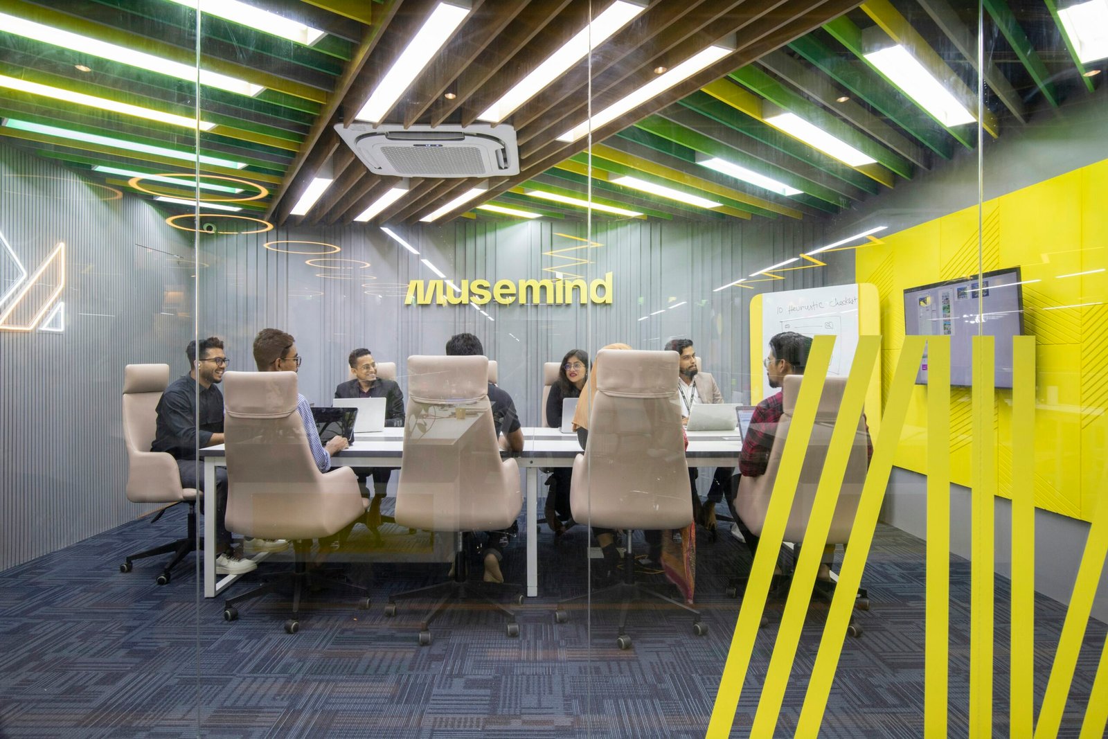 a group of people sitting around a table