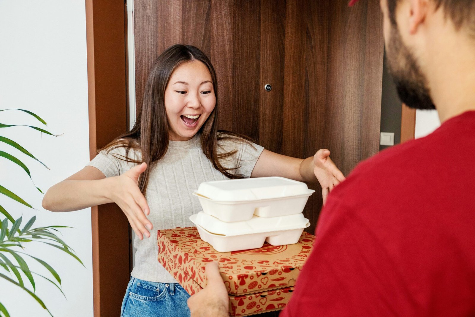 Food delivery makes a woman very happy.