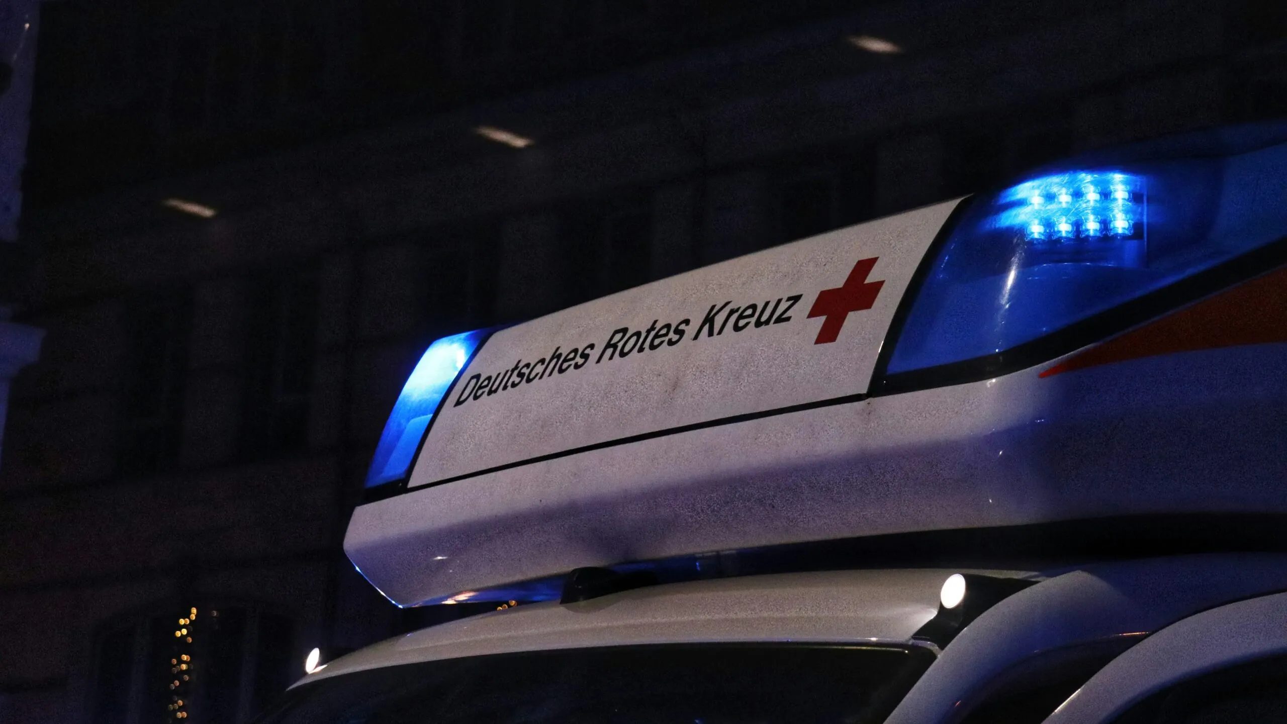 a police car parked in front of a building