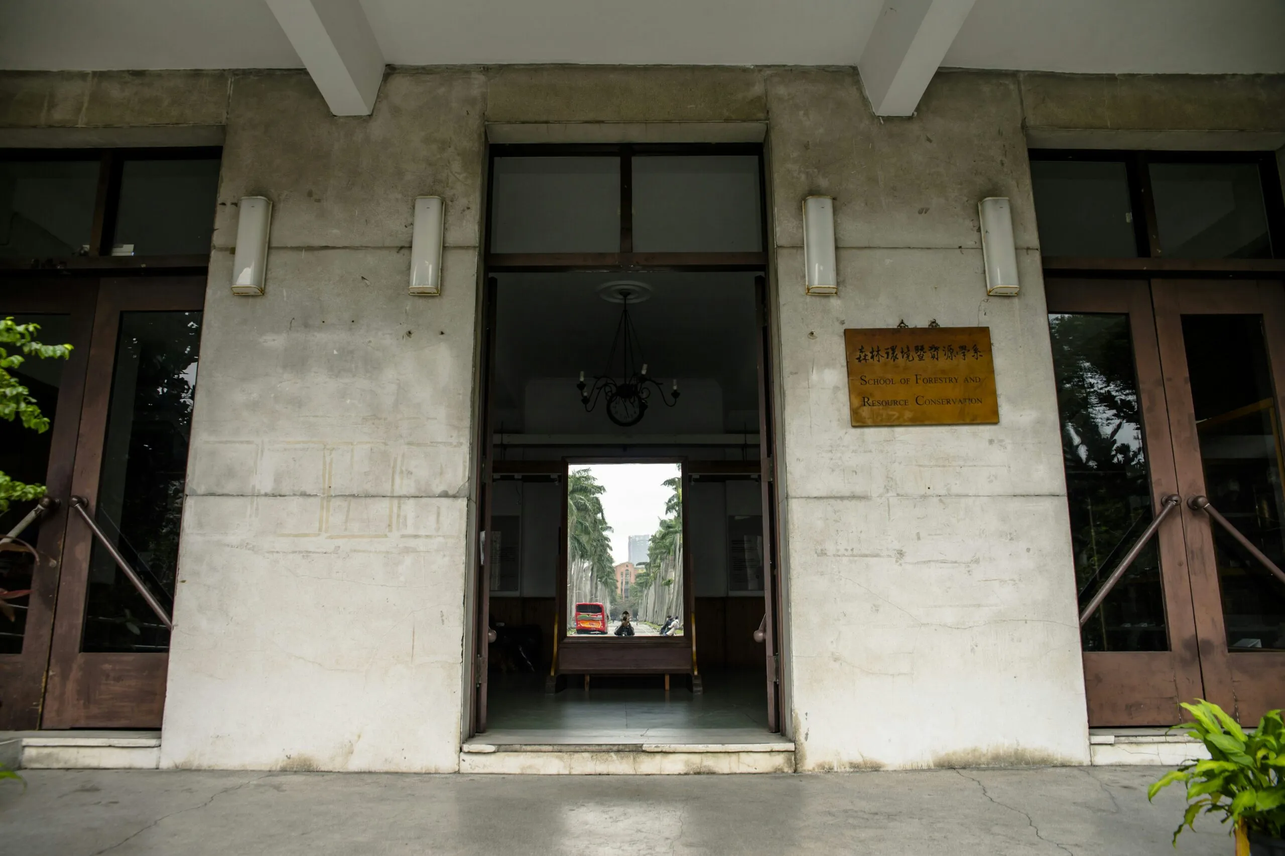 the entrance to a building with two doors