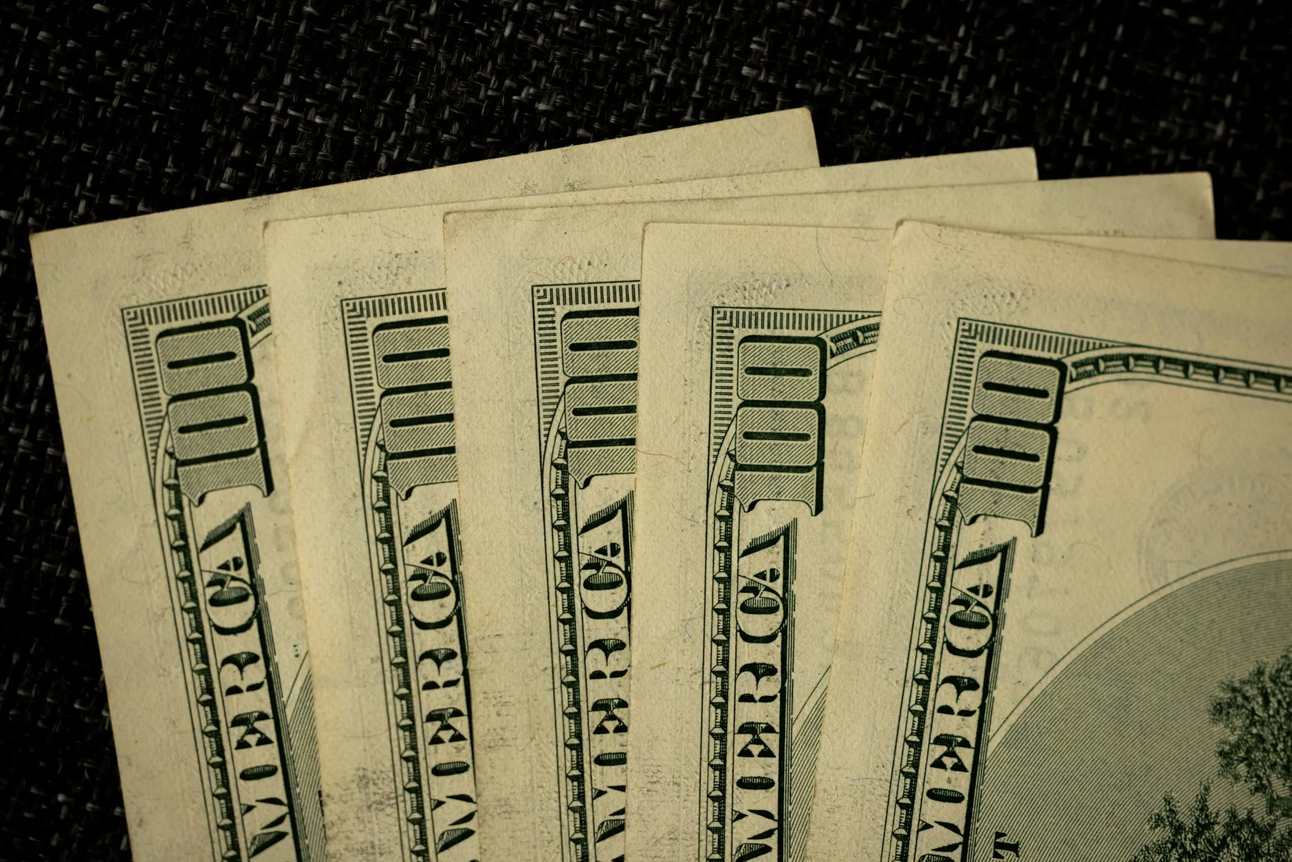 a close up of a bunch of money on a table