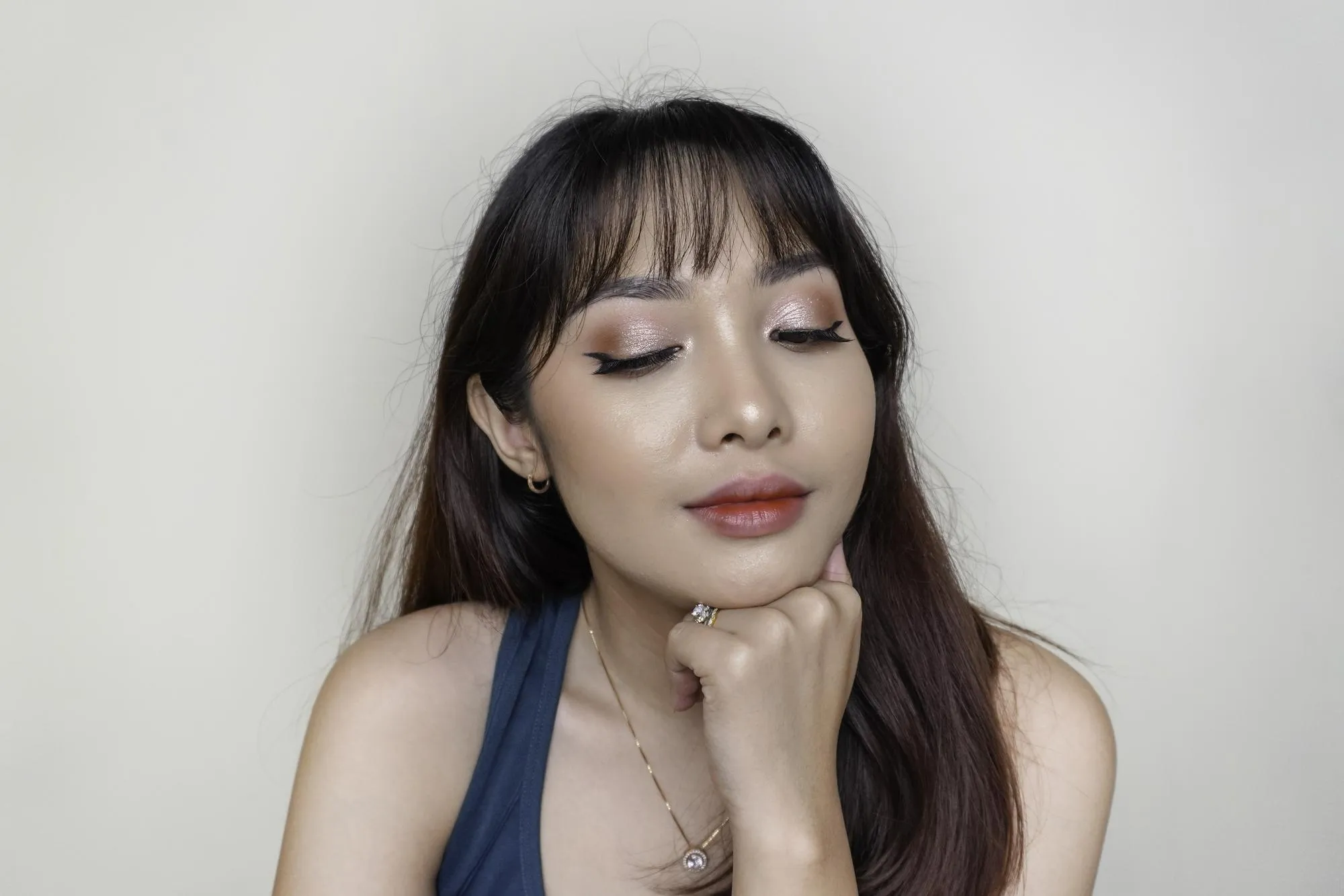 A beauty cheerful face of Asian young model wearing teal green top Makeup skincare beauty facial treatment spa female health concept