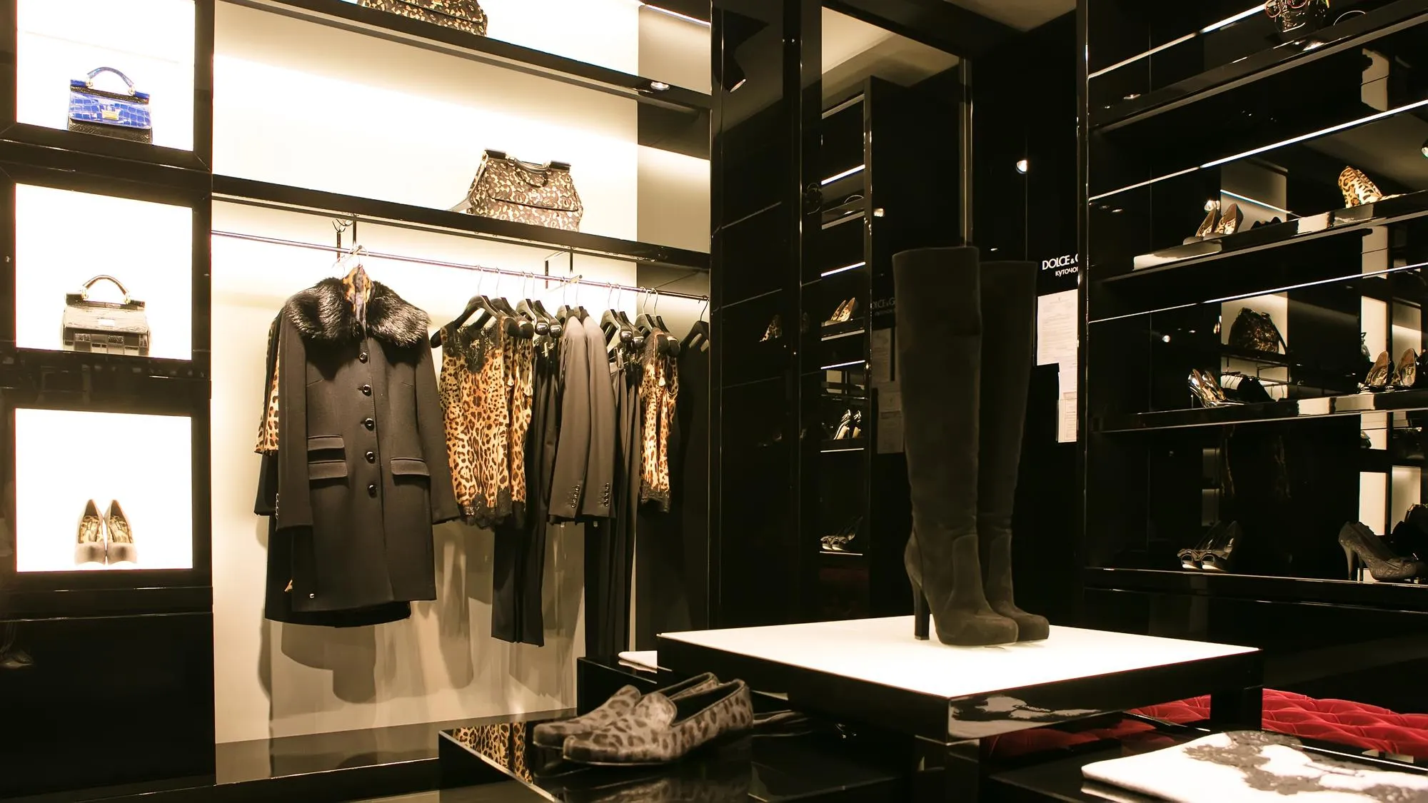 Bright and fashionable interior of shoe store in modern mall