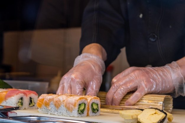 Chef preparing sushi in a restaurant
