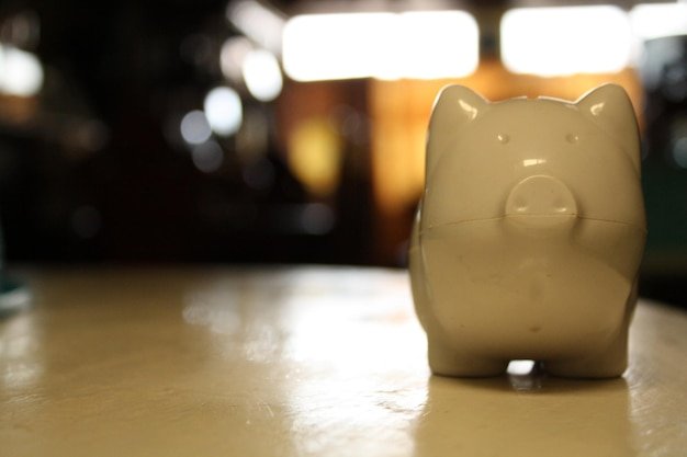Close-up of illuminated lamp on table