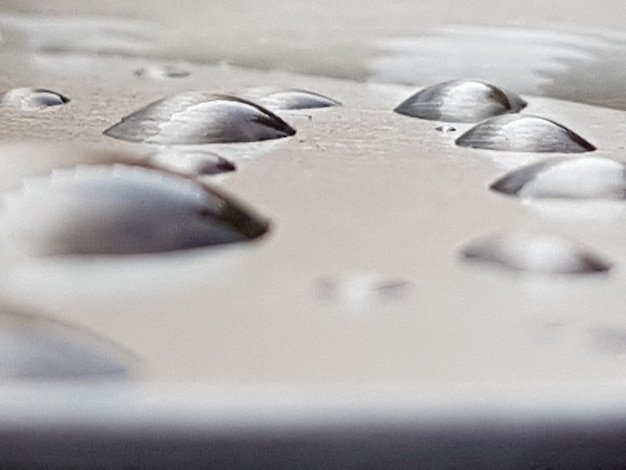Close-up of water drops on table
