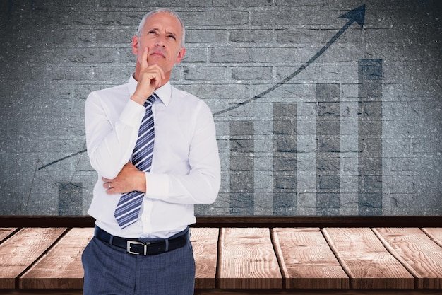 Composite image of smiling dark haired model with classy dress holding out her hand