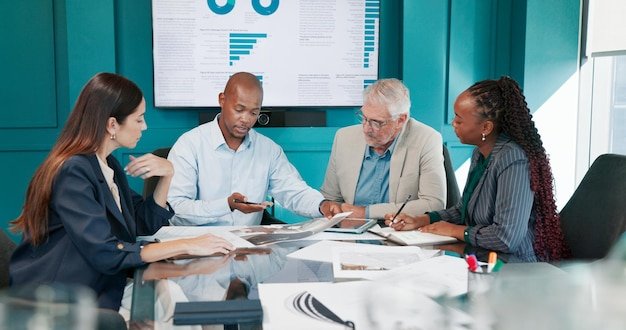 Data analysis colleagues and discussion with paperwork in boardroom meeting and financial growth Office business analyst and people with report for performance conversation and collaboration
