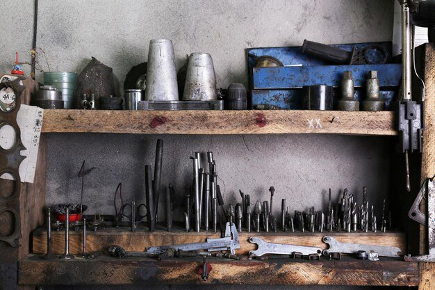 Different tools on workplace in garage