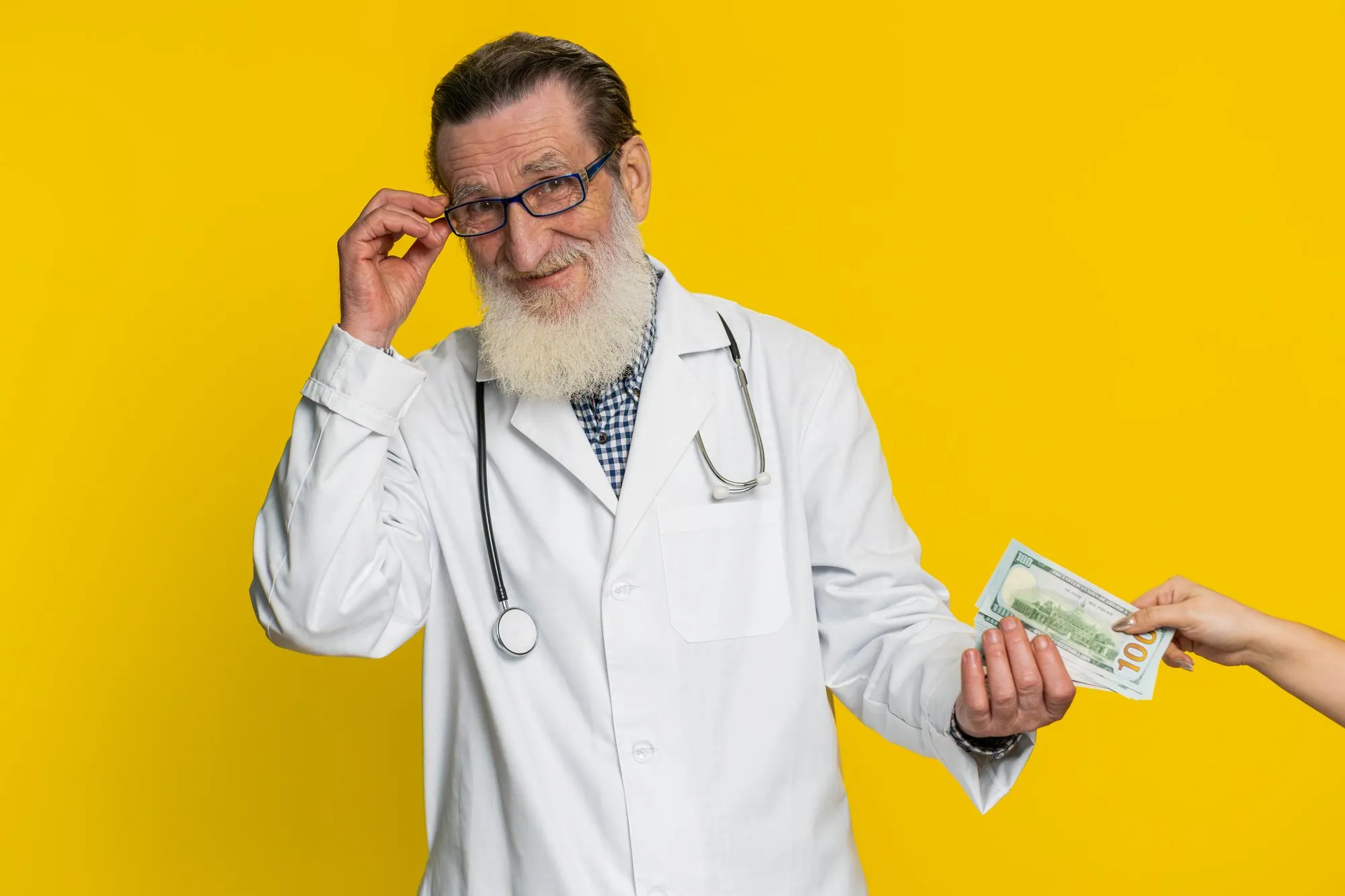 Doctor man receive bribe from patient taking money from client hiding cash into pocket corruption