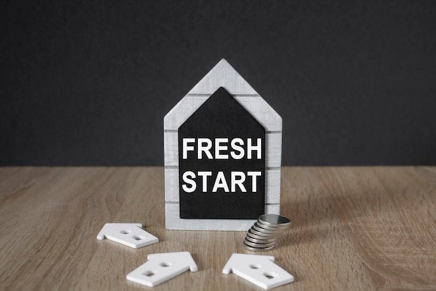 Fresh start and motivational symbol Concept words Fresh start on black blackboard
