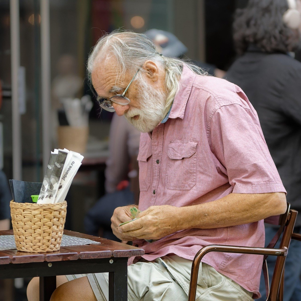 restaurant, old man, elderly, beard, casual, sitting, counting money