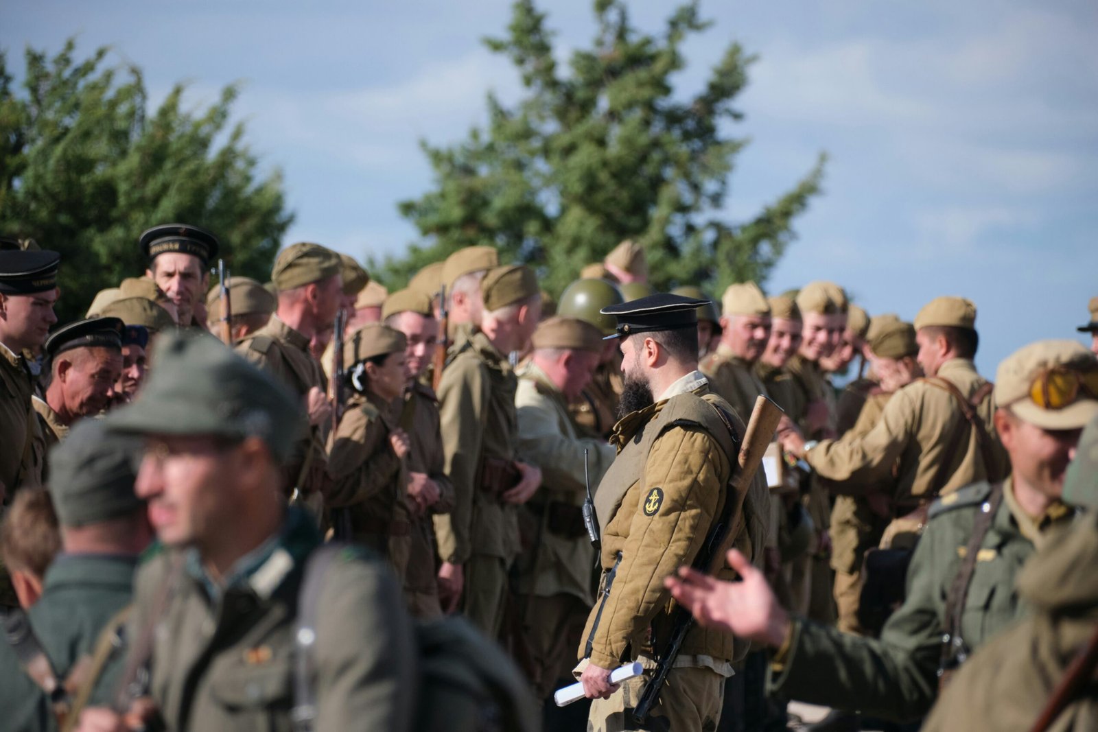 a group of men in uniform standing next to each other
