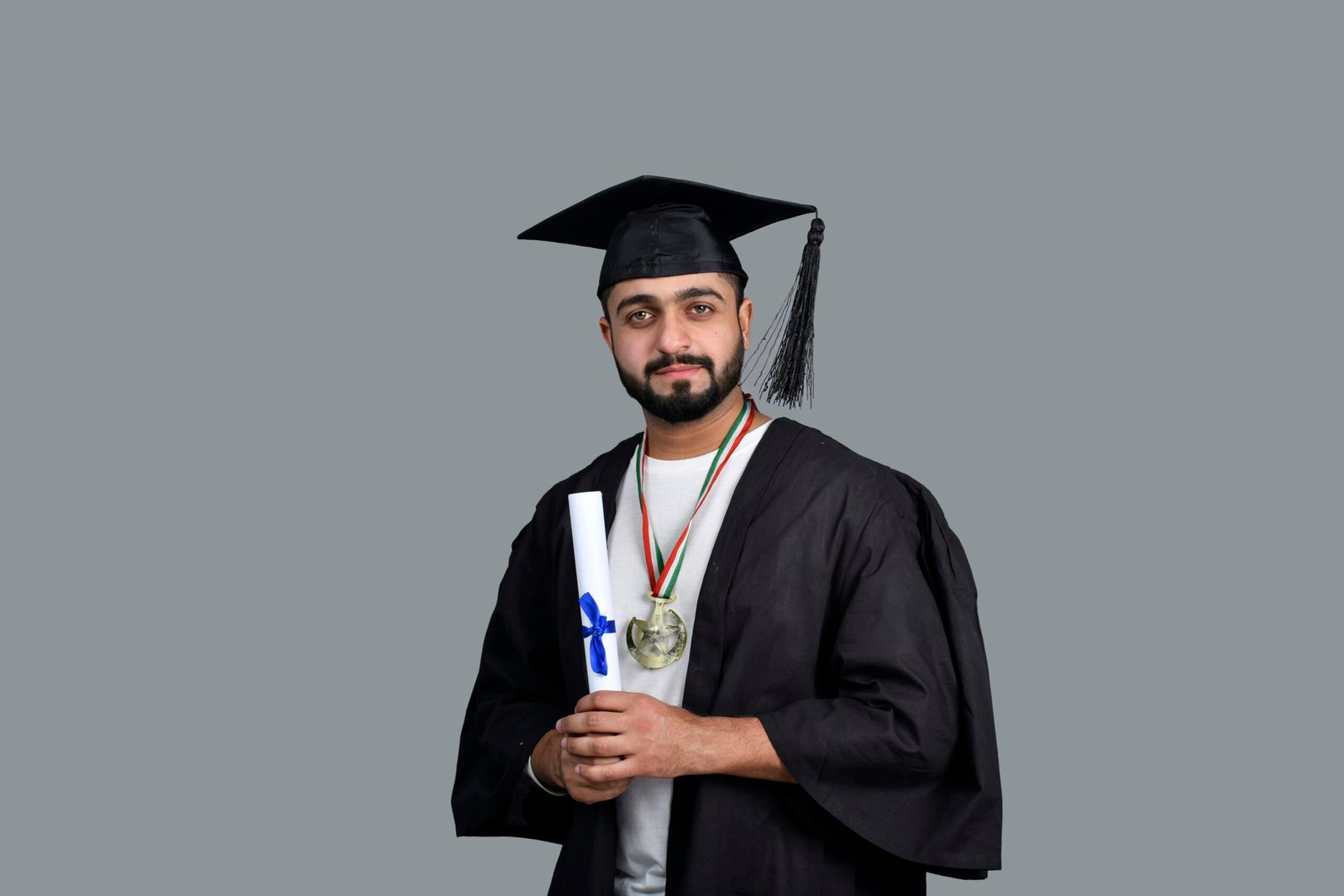a man wearing a cap and gown