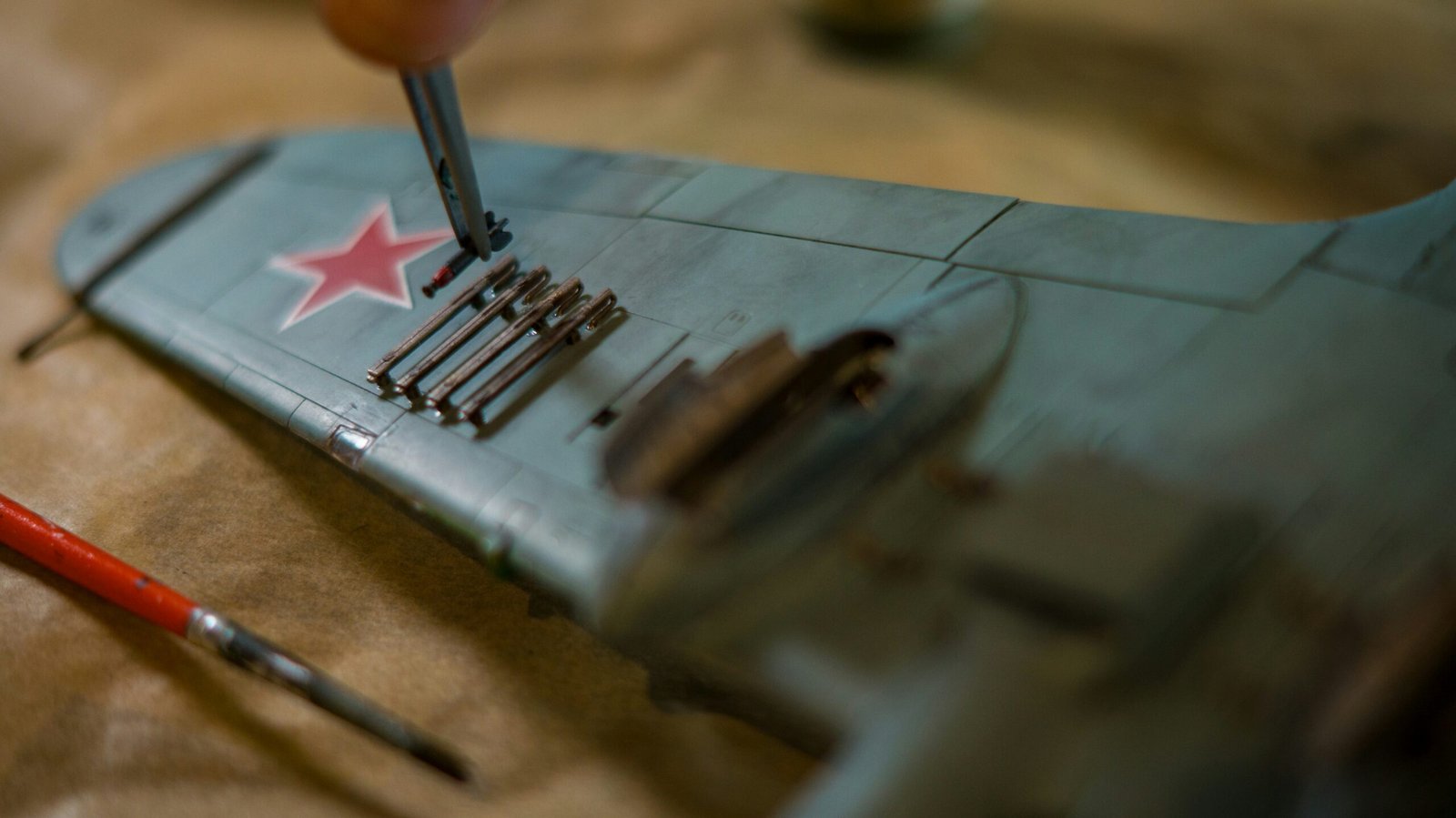 a toy airplane with a red star on it