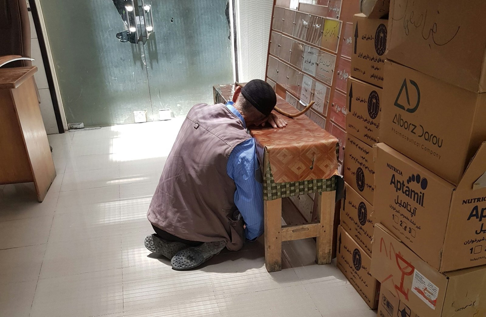 man sitting on floor