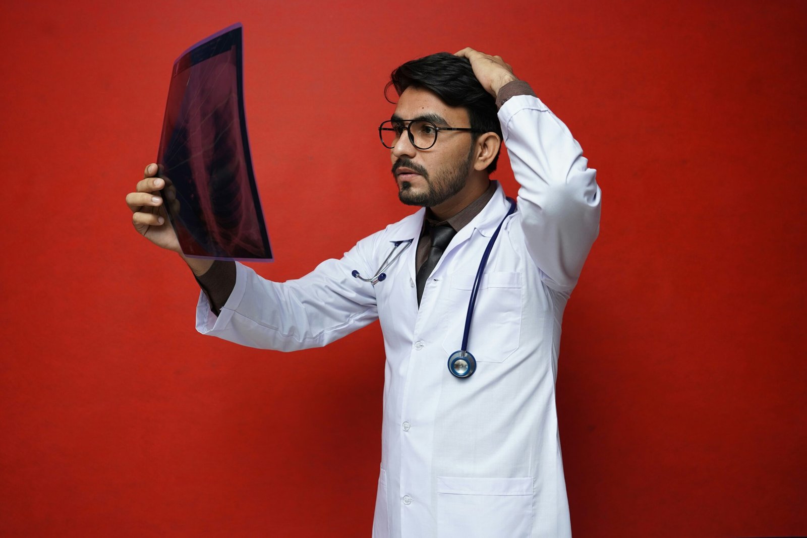 a doctor holding a clipboard