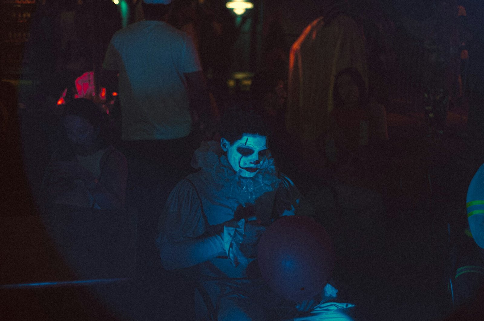 A group of people in a dark room