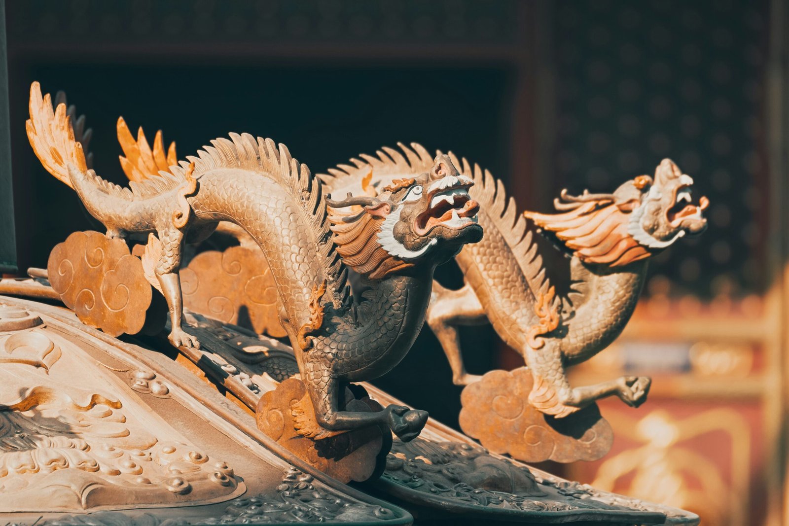 gold dragon figurine on black table