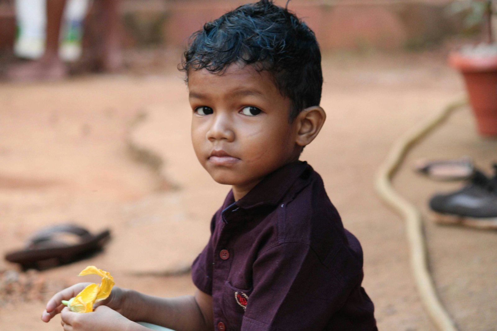 boy in red button up shirt