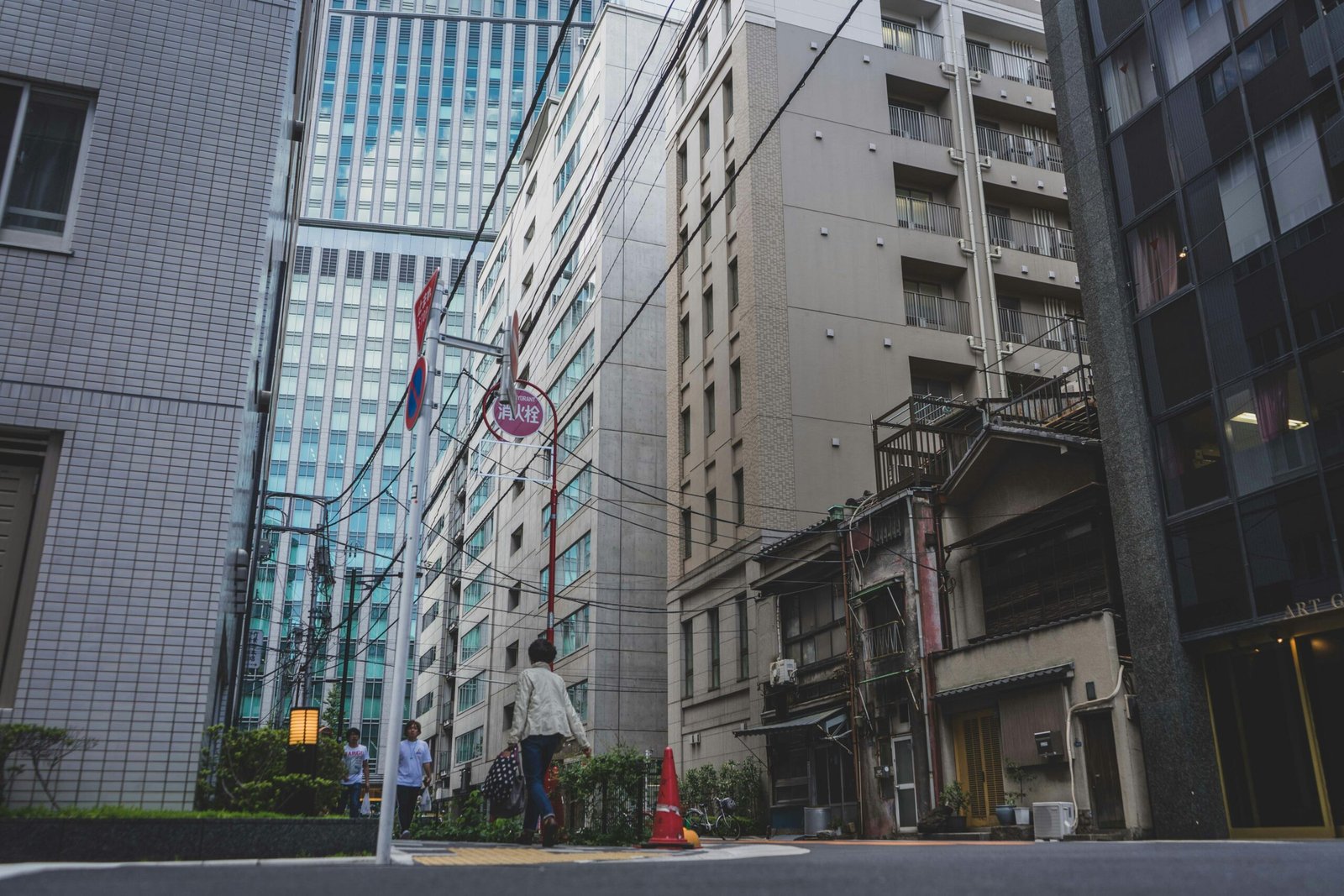 a street with buildings and people