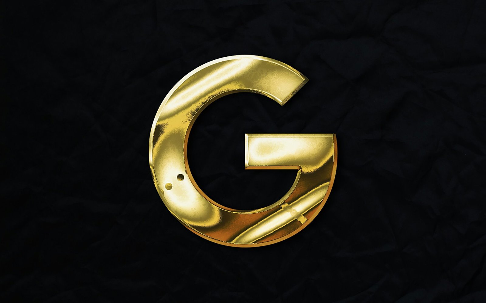 a gold letter g on a black background