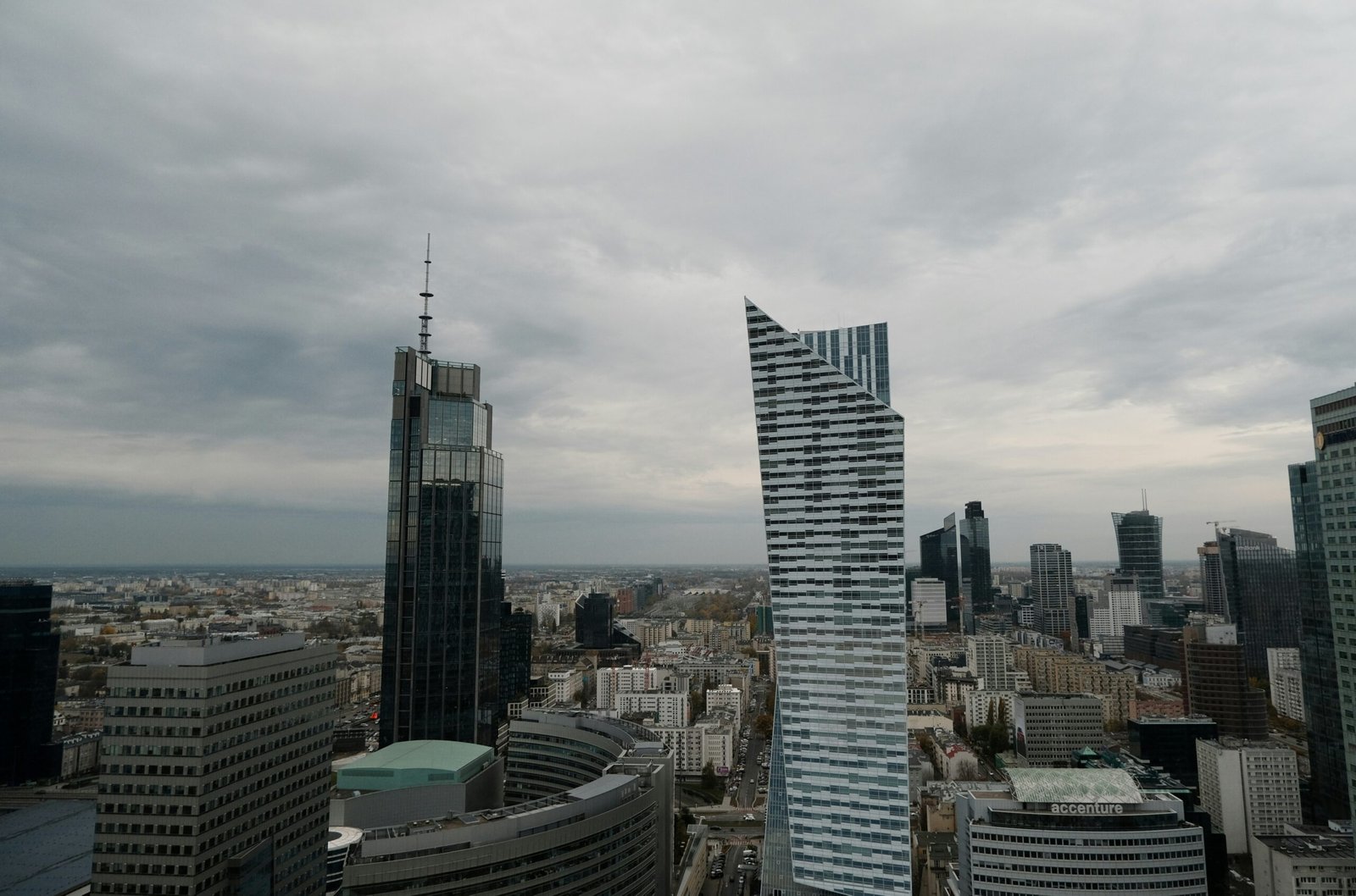 a view of some very tall buildings in a big city
