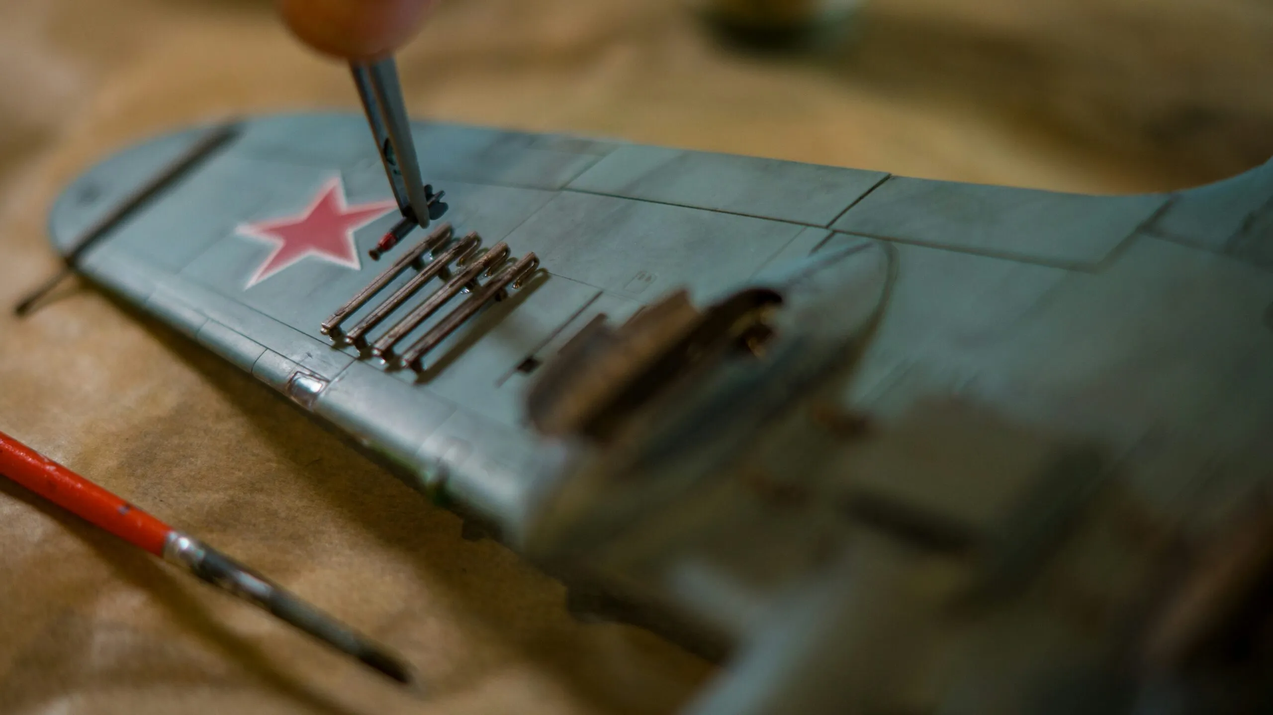 a toy airplane with a red star on it