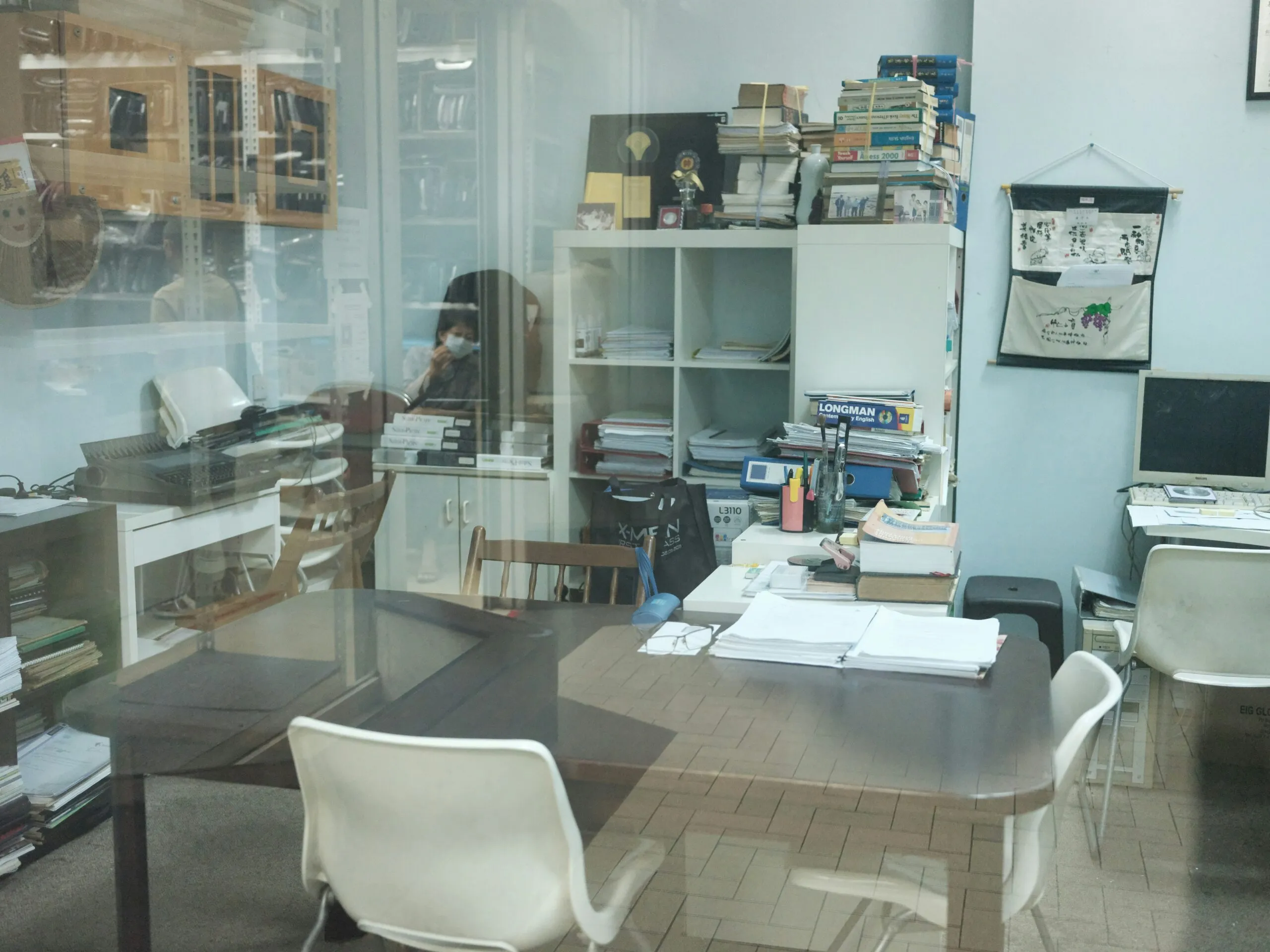 a room filled with lots of clutter and furniture