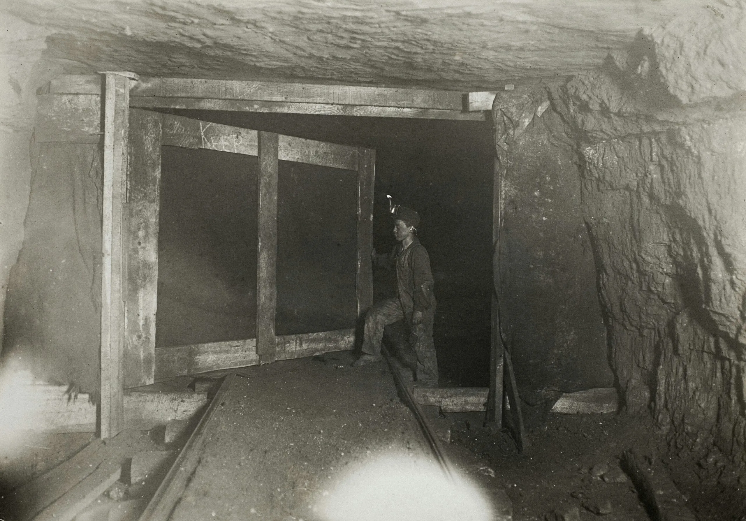 Artist Lewis Wickes Hine Title Young Trapper Boy in West Virginia Coal Mine) Place United States (Artist's nationality:) Date Made 1908 Medium Gelatin silver print https://www.artic.edu/artworks/23209/young-trapper-boy-in-west-virginia-coal-mine