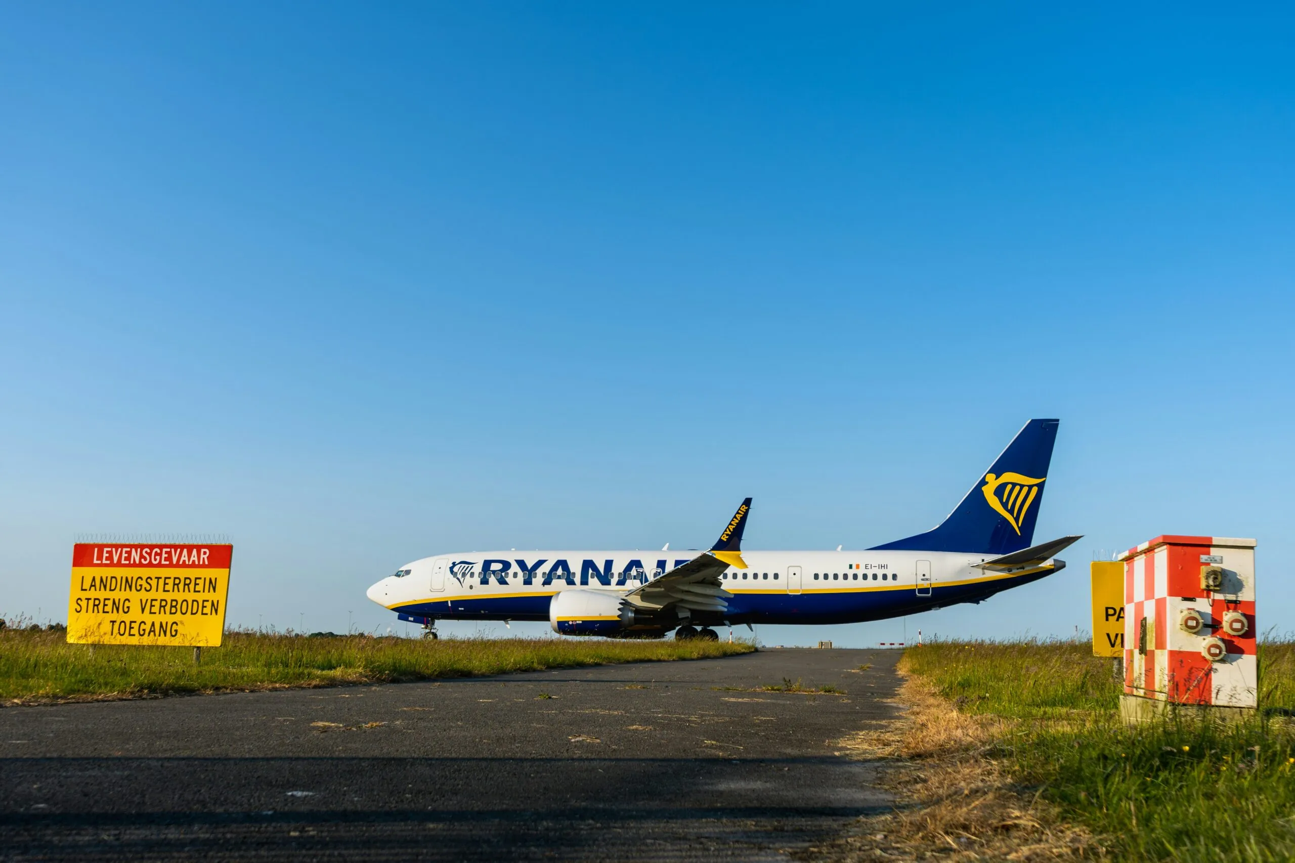 a large jetliner sitting on top of an airport runway
