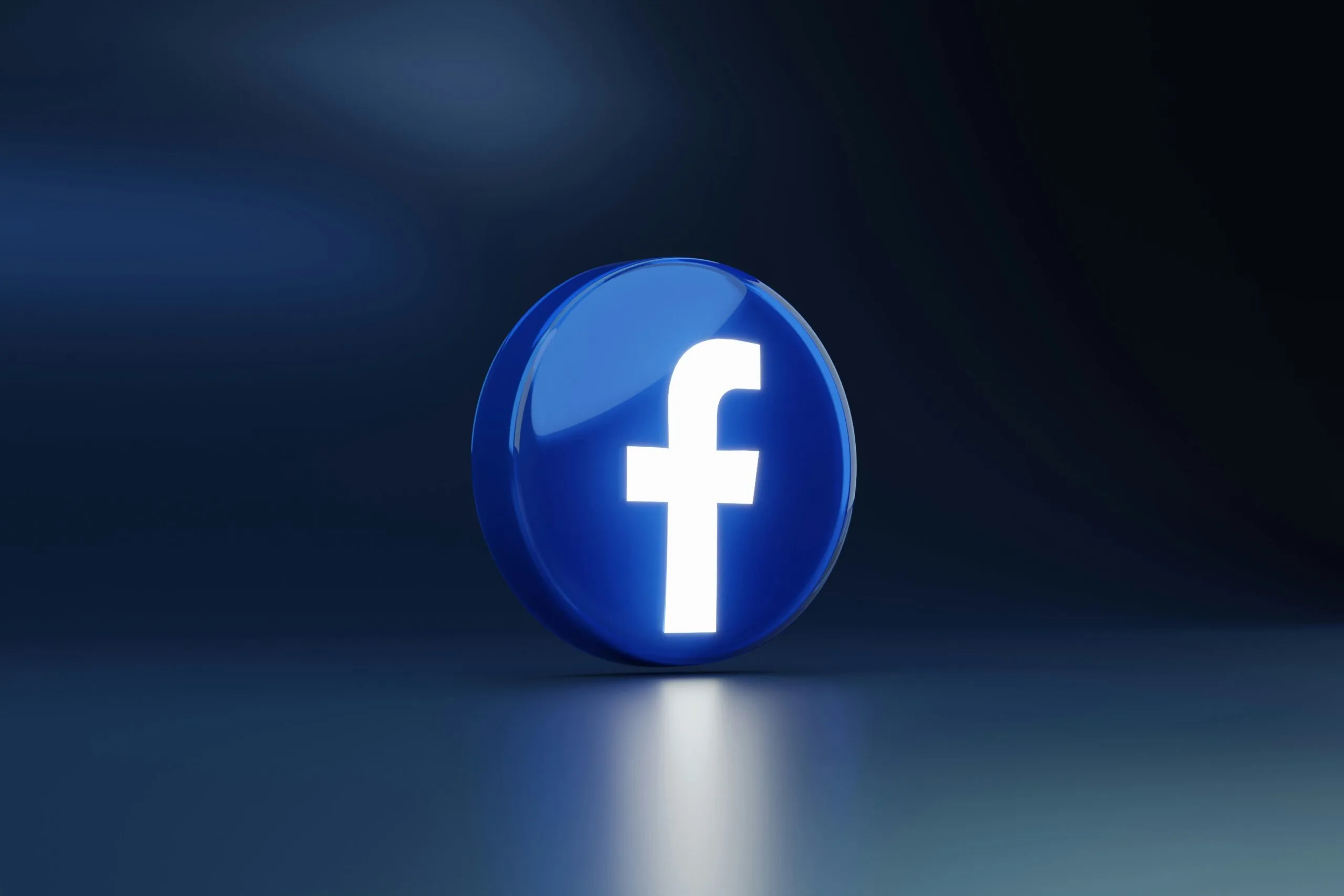 a blue logo with a white cross