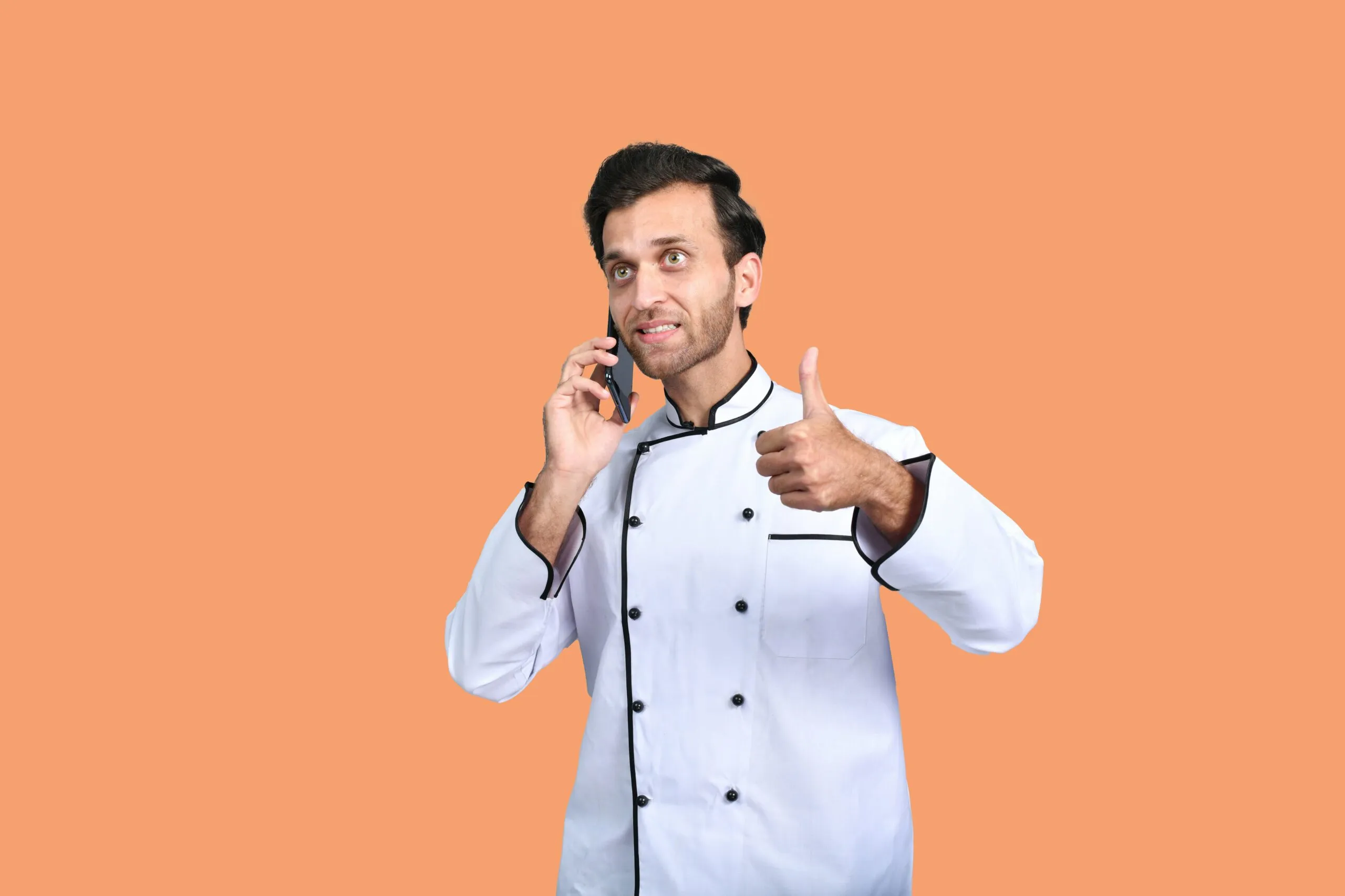 a man talking on a cell phone