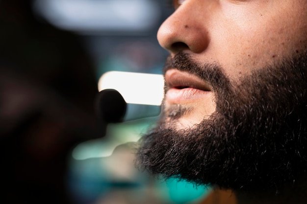 Intelligence agency expert using headset mic to call in air strikes on enemy troops close up of