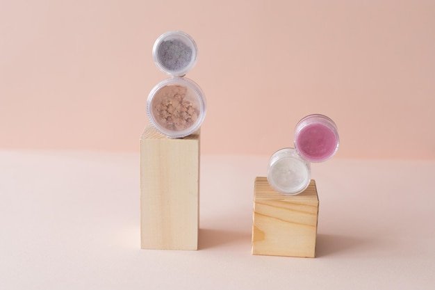 Makeup mineral eco face powder products on pastel background eco friendly cosmetics eyeshadows and b