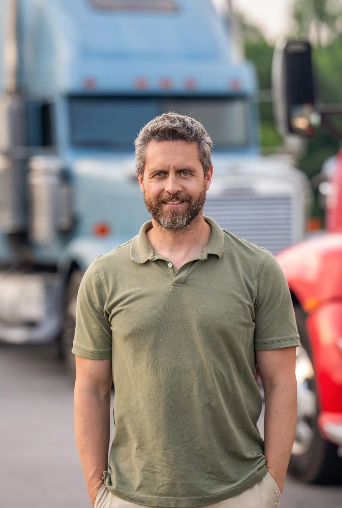 Man trucker driver near lorry truck Transportation vehicles Semi trucks vehicle Hispanic man trucker Handsome man driver in front of truck Trucking owner Truck driver Regional drivers