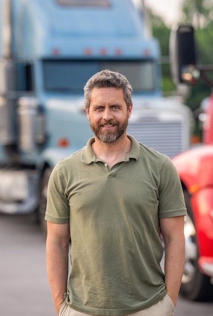 Man trucker driver near lorry truck Transportation vehicles Semi trucks vehicle Hispanic man trucker Handsome man driver in front of truck Trucking owner Truck driver Regional drivers