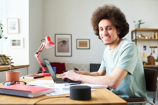 Man using smart speaker at his work