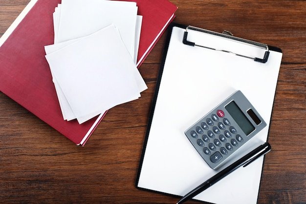 Office supply on wooden background