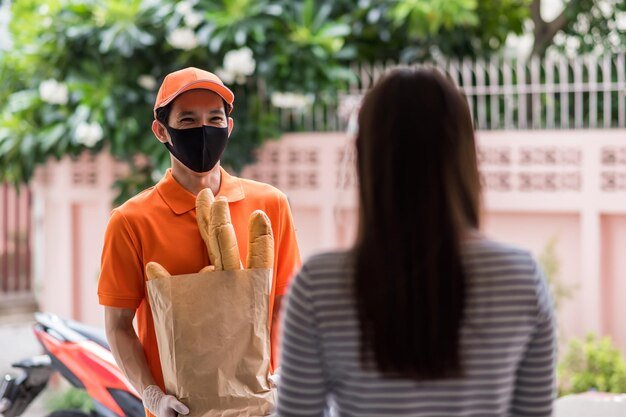 Portrait of a man with woman standing outdoors