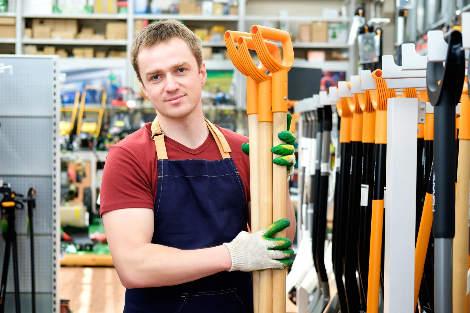 Seller with equipment tools at store