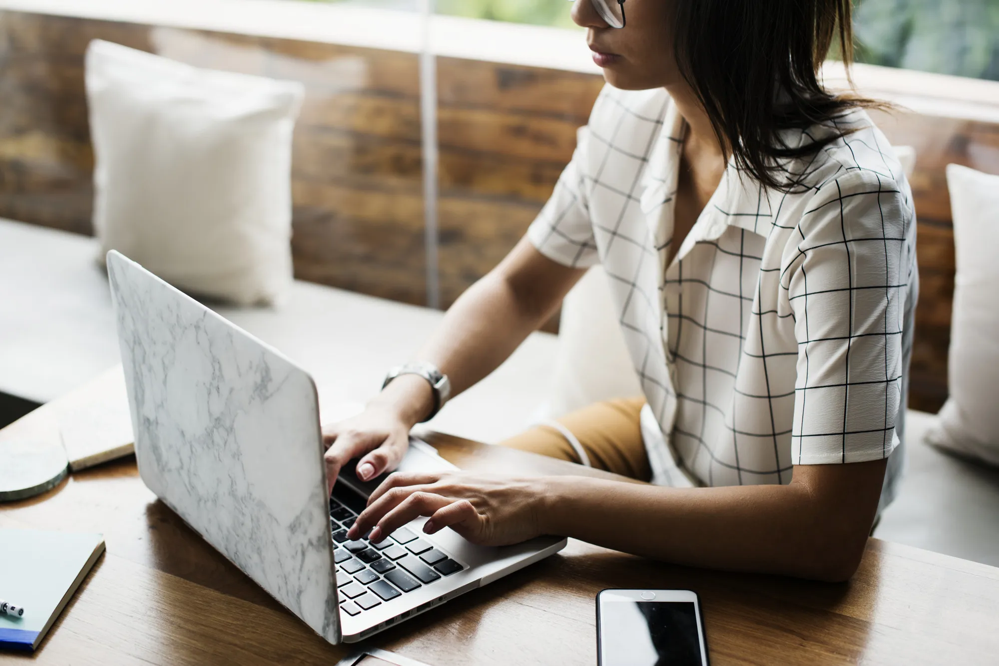 Stylish woman working on a laptop