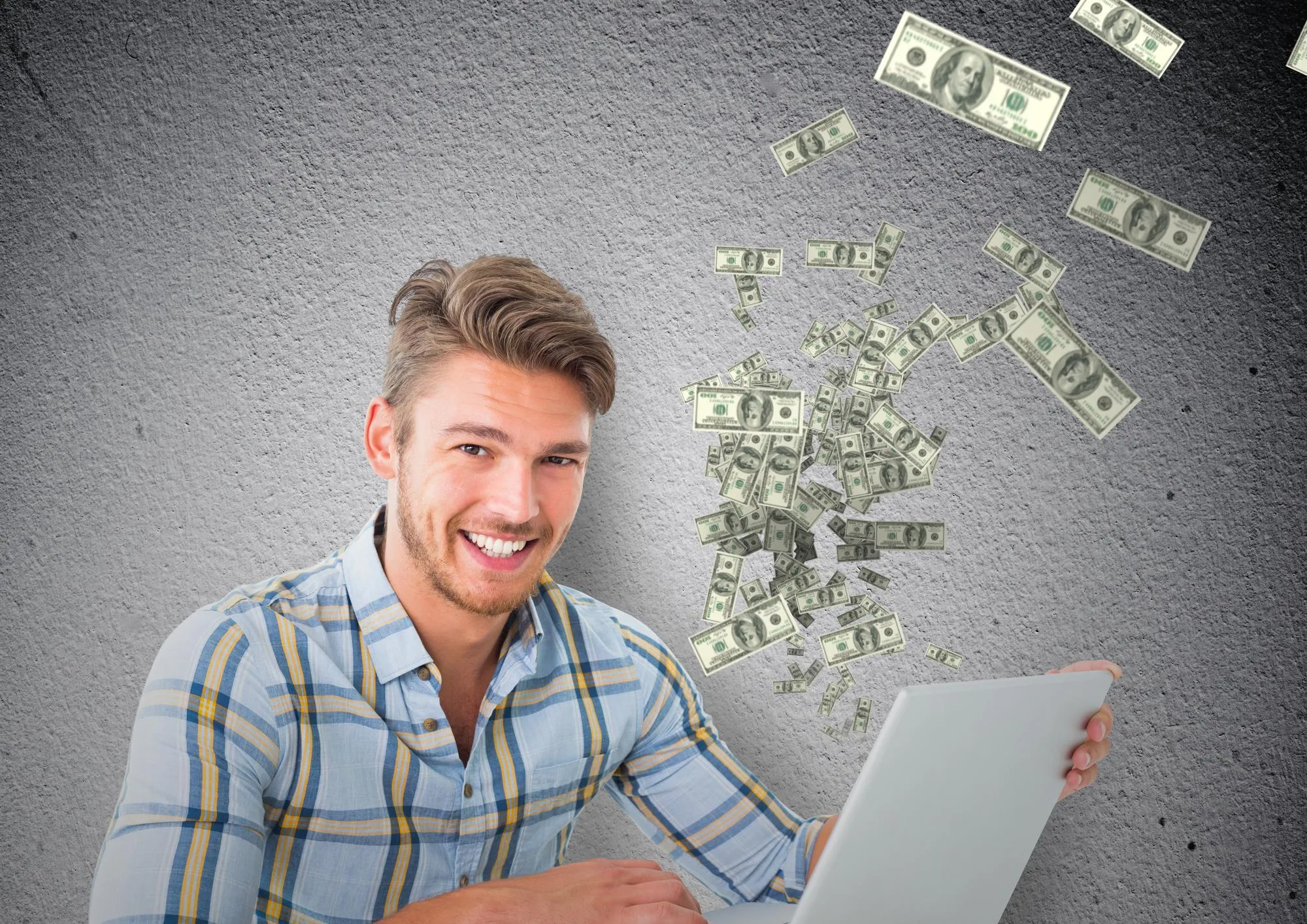texting money. happy man with laptop, money coming up from laptop