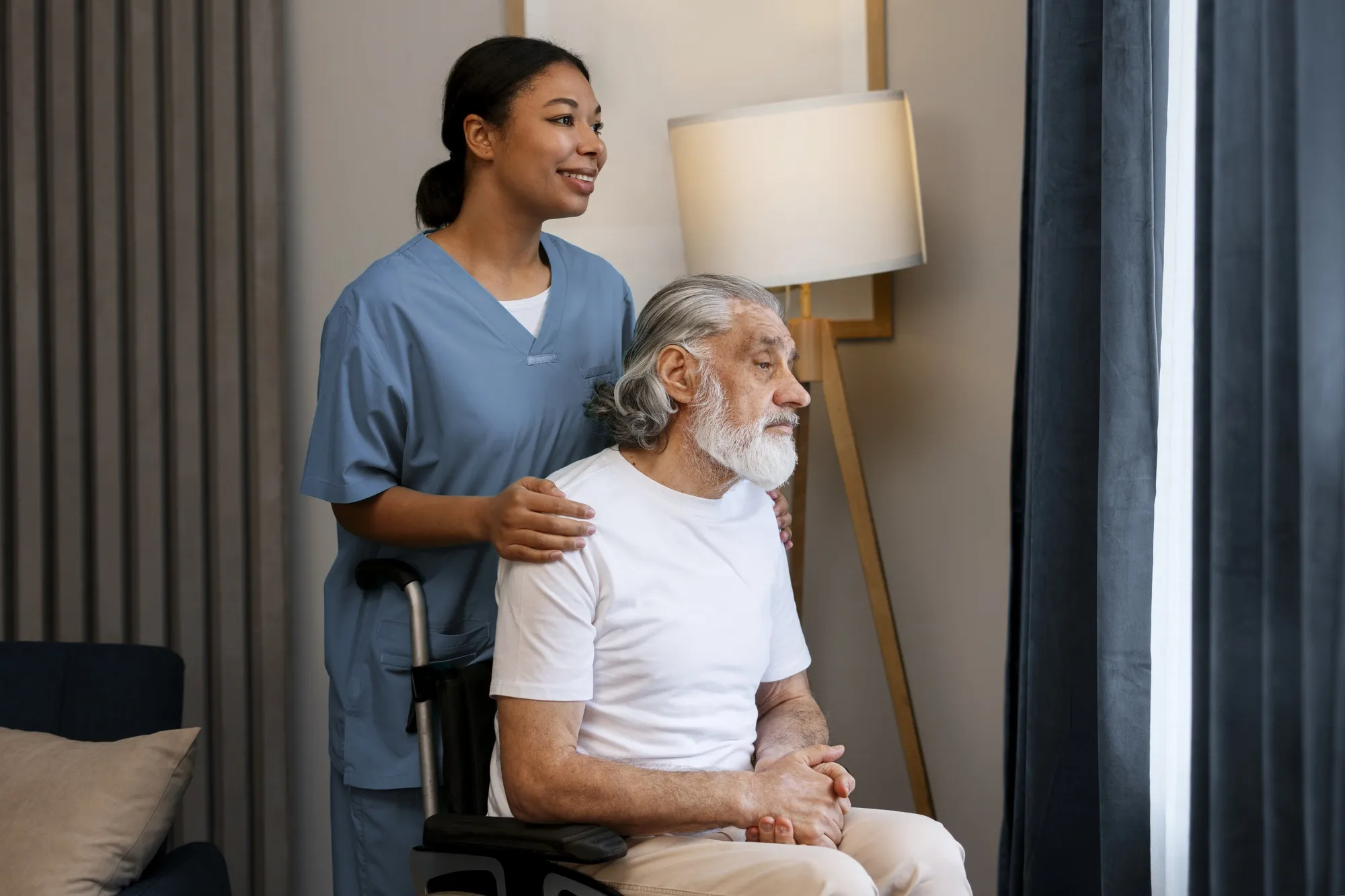 Woman taking care of old man