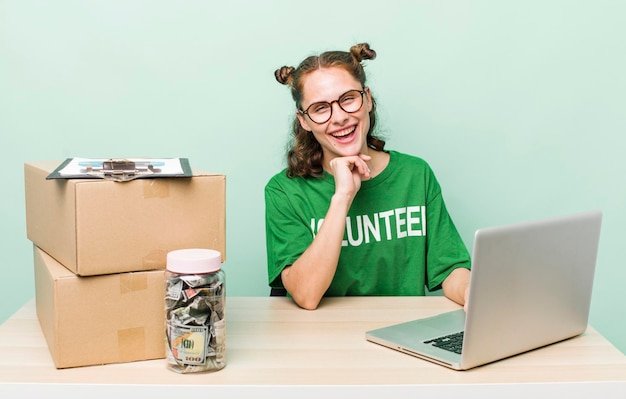 Young adult pretty woman volunteer donation concept