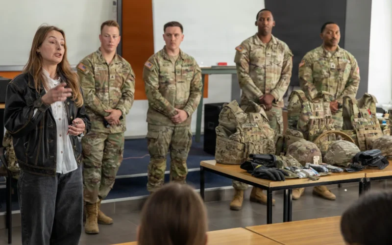 Ms. Aneta Matera, a teacher introduces U.S. Army V Corps Soldiers from the 109th Military Police Battalion to a classroom of students at the National Education Commission Mechanical Vocational School in Poznan, Poland, April 17, 2026. V Corps Soldiers were invited to the school for a cultural exchange and to educate students of Klasy Mundurowe (Military Classes, similar to ROTC in the U.S.) on why the U.S. Army maintains a presence in Poland and why it is important to NATO. V Corps enhances regional security, strengthens interoperability, and supports deterrence efforts across the European theater. (U.S. Army Reserve photo Sgt. Shaun R. Rajasekar)