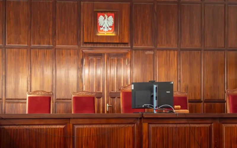 A beautifully crafted wooden courtroom with the Polish emblem in Wrocław, Poland.