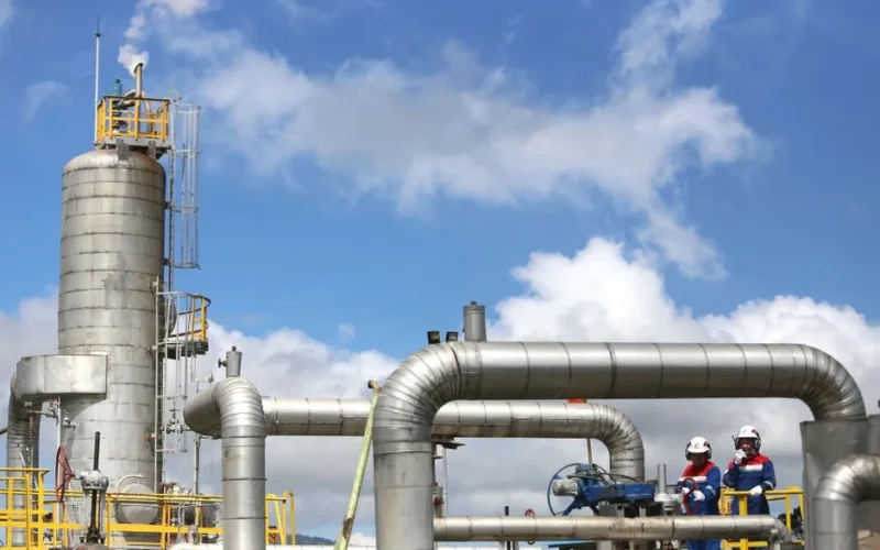 Modern gas plant operations with engineers in Lampung, Indonesia.