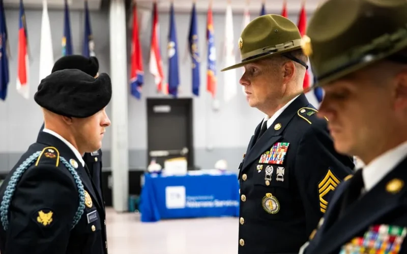 Uniformed soldiers in a military ceremony displaying pride and discipline in Knoxville, Tennessee.